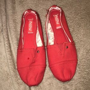 Red slip on shoes, flats